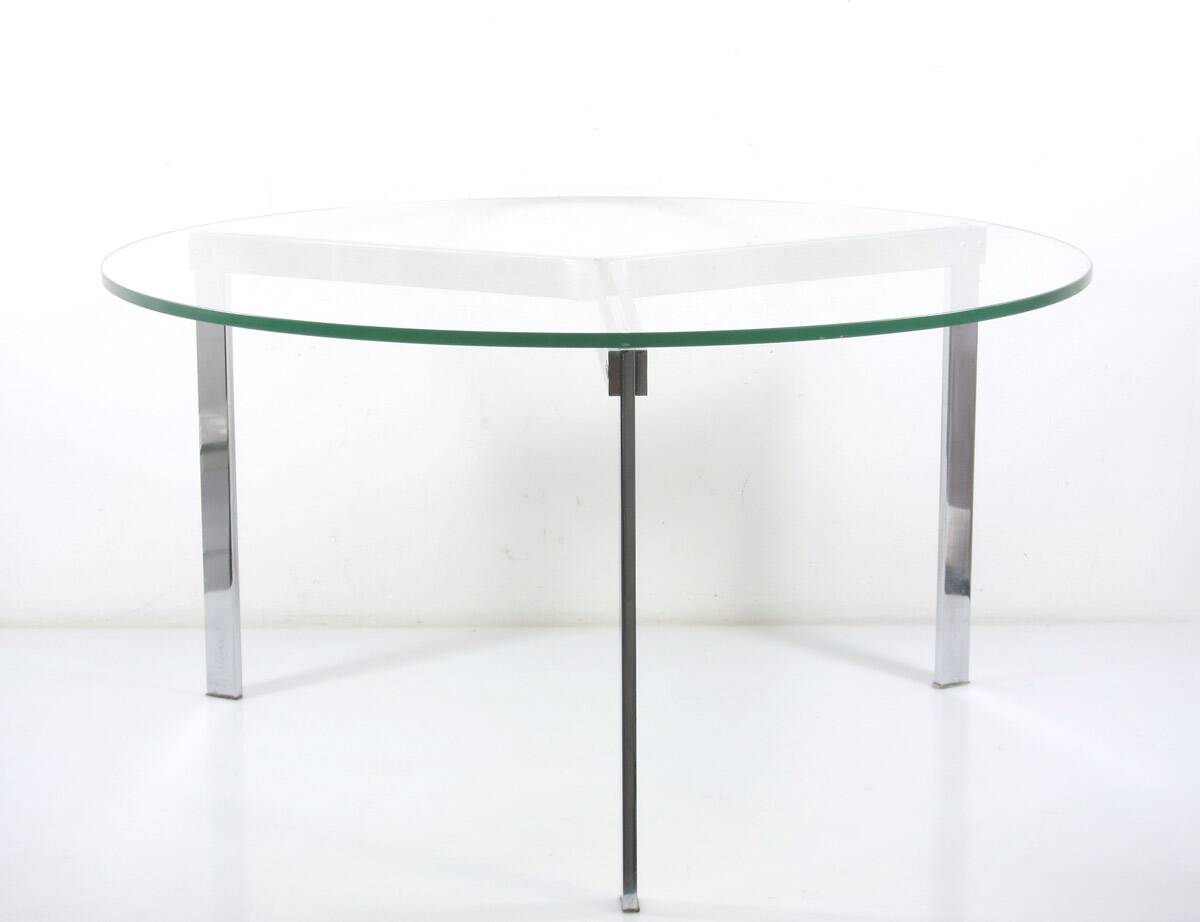Modernist glass coffee table with stainless steel base
