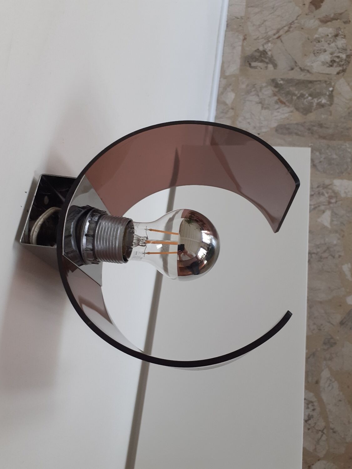 Space age plexiglass wall light.