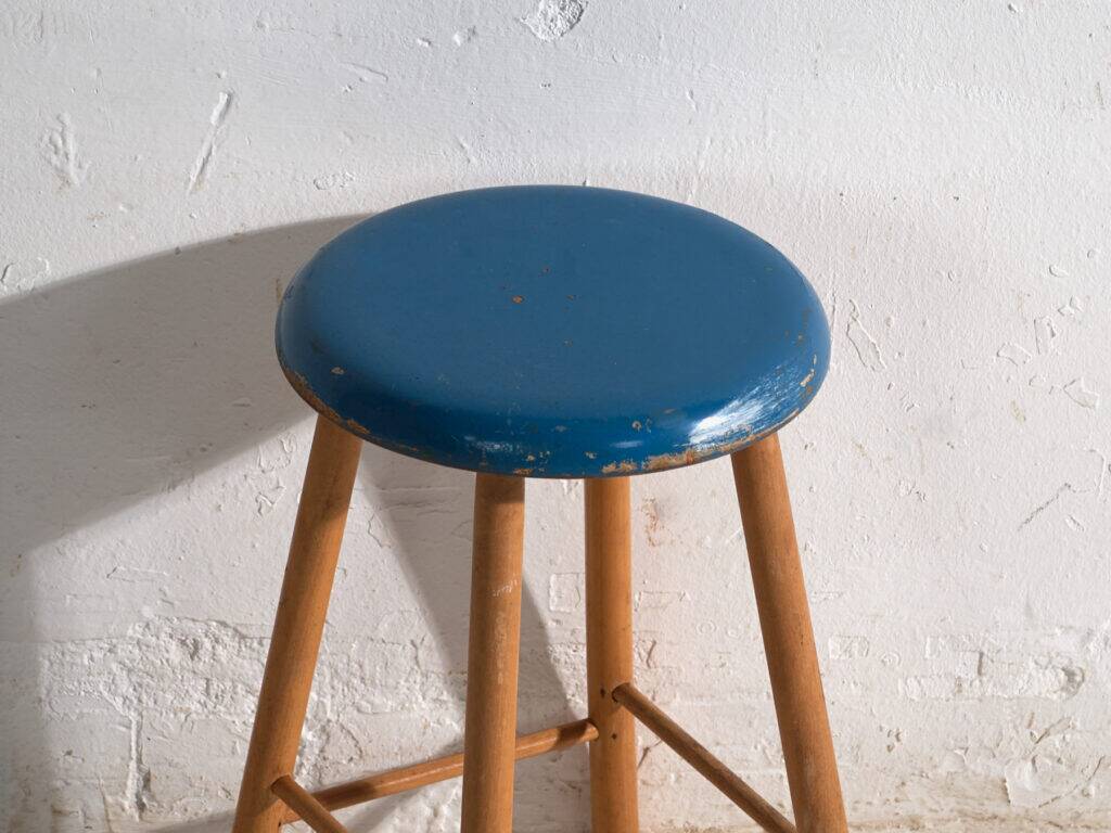 Antique wooden stool with a round seat – Central Europe, around 1950