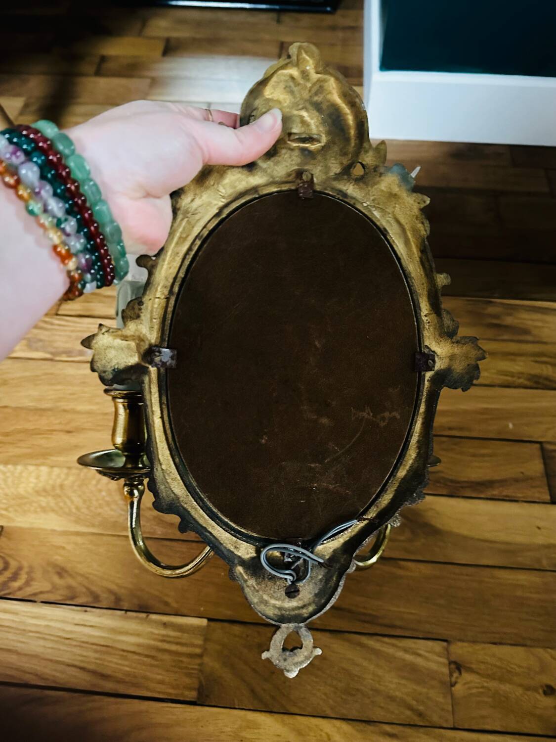 Antique bronze mirror wall sconce