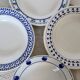 4 mismatched vintage blue and white earthenware soup plates - Set