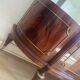 Large Louis XVI style display cabinet in wood and marble.