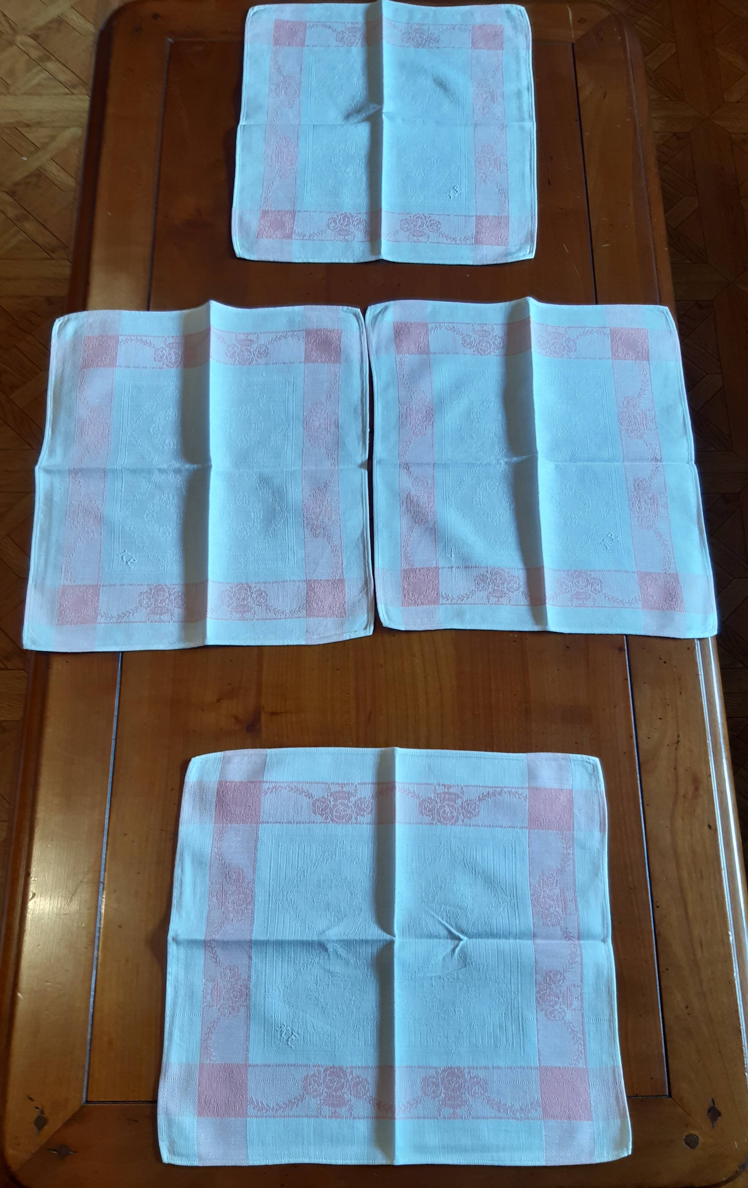 4 embroidered napkins on thread, tea service. Pink trim. Initials M.P.