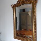 Miroir en bois stuqué doré XIXème siècle 92x142cm
