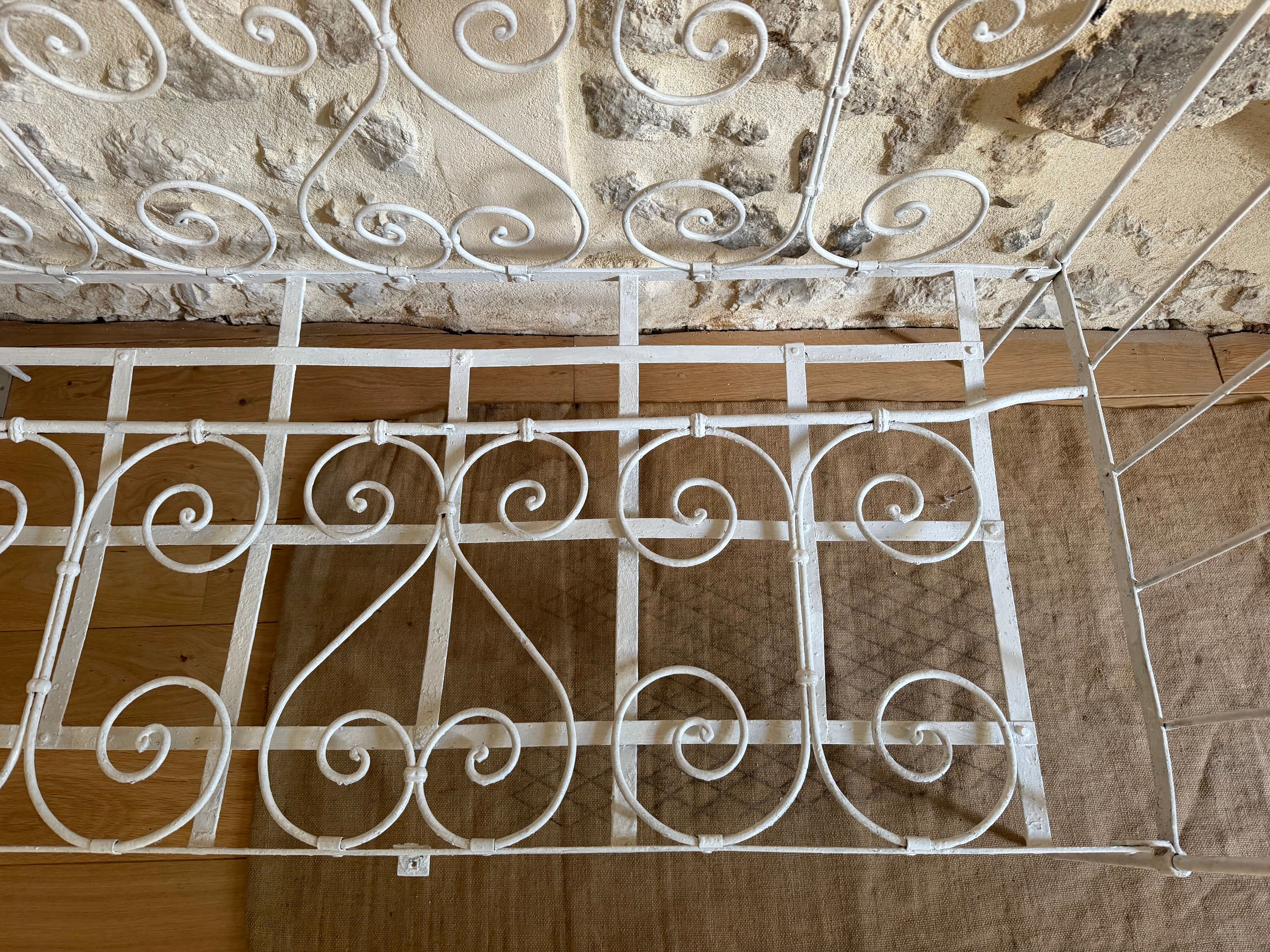 Small renovated wrought iron bed