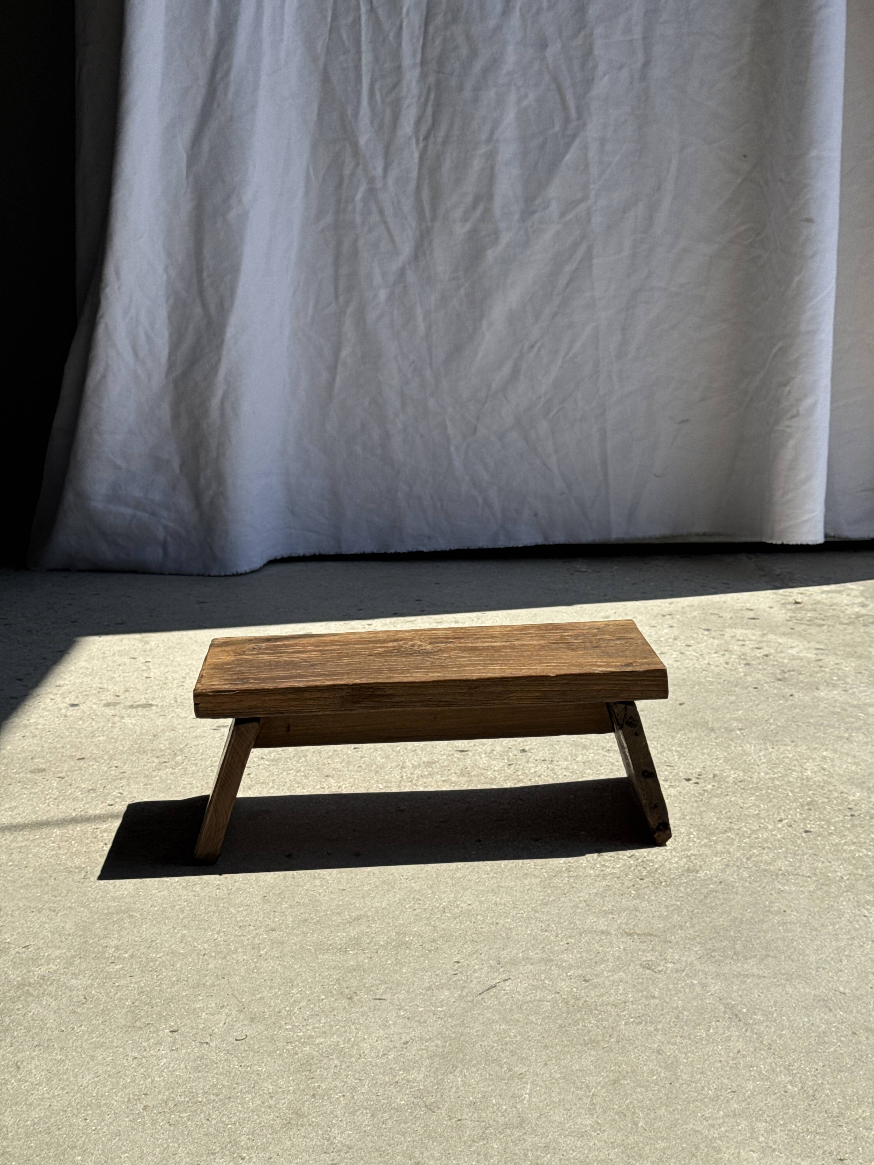 Small low bench in old teak from Indonesia H16 L39
