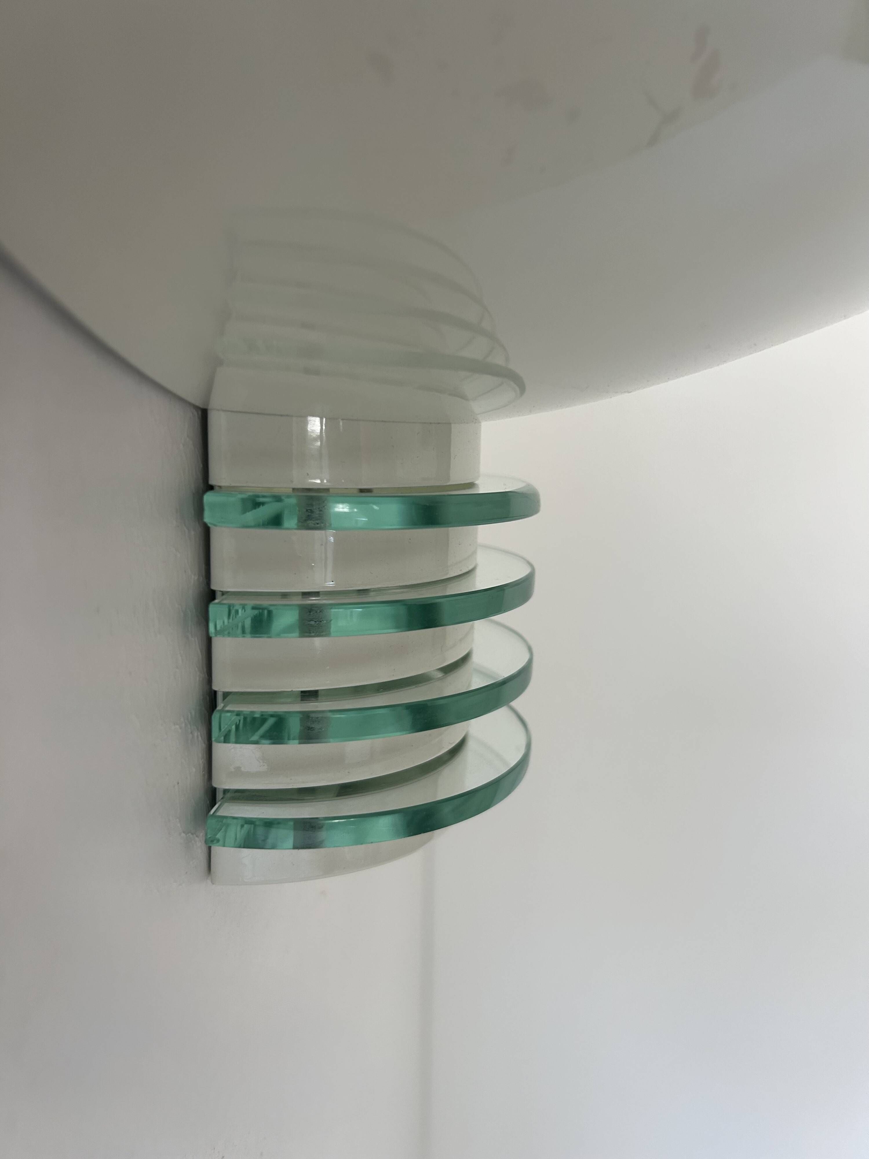 Pair of post-modernist wall lights, white metal and glass, France 1980