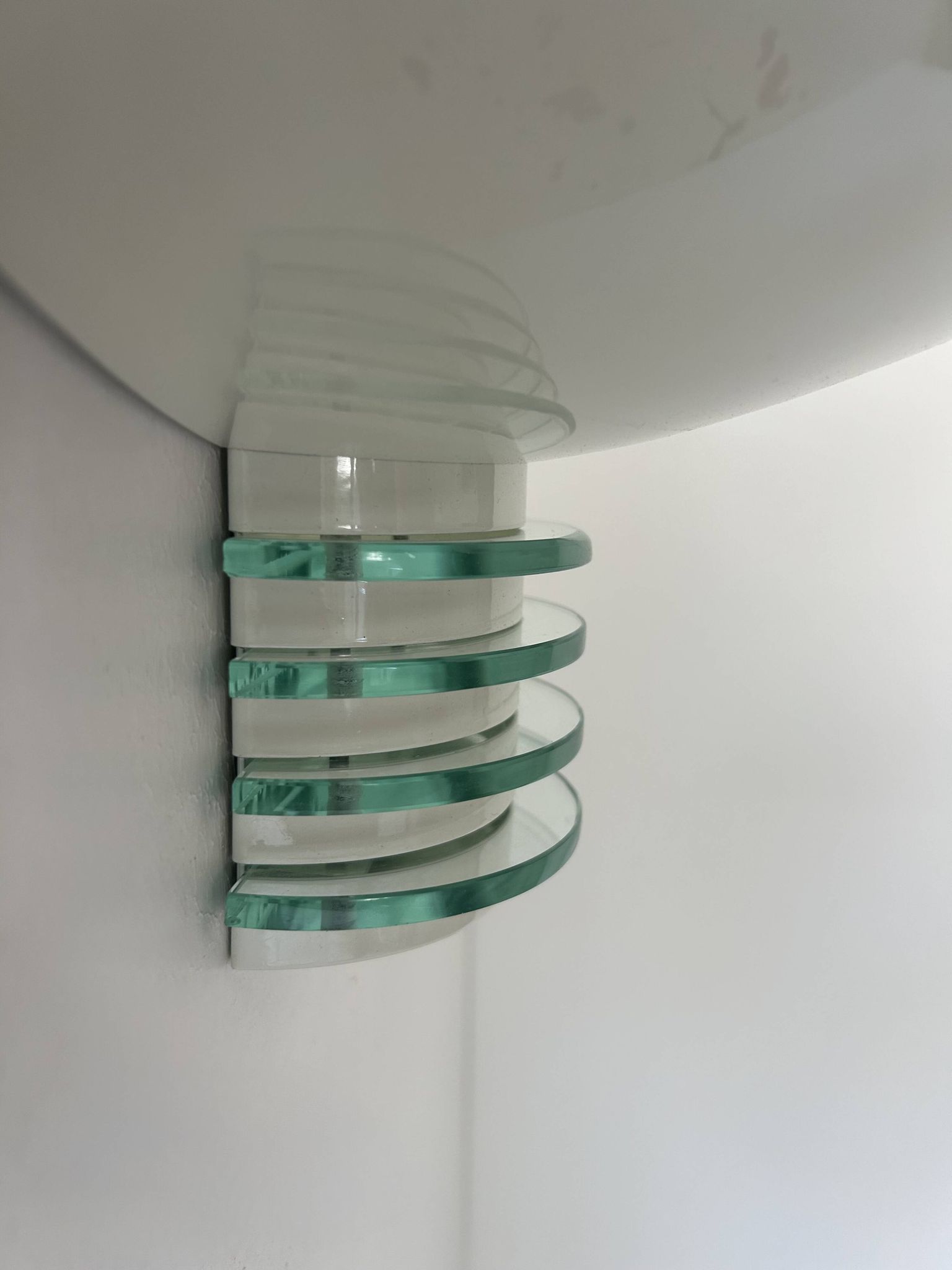 Pair of post-modernist wall lights, white metal and glass, France 1980