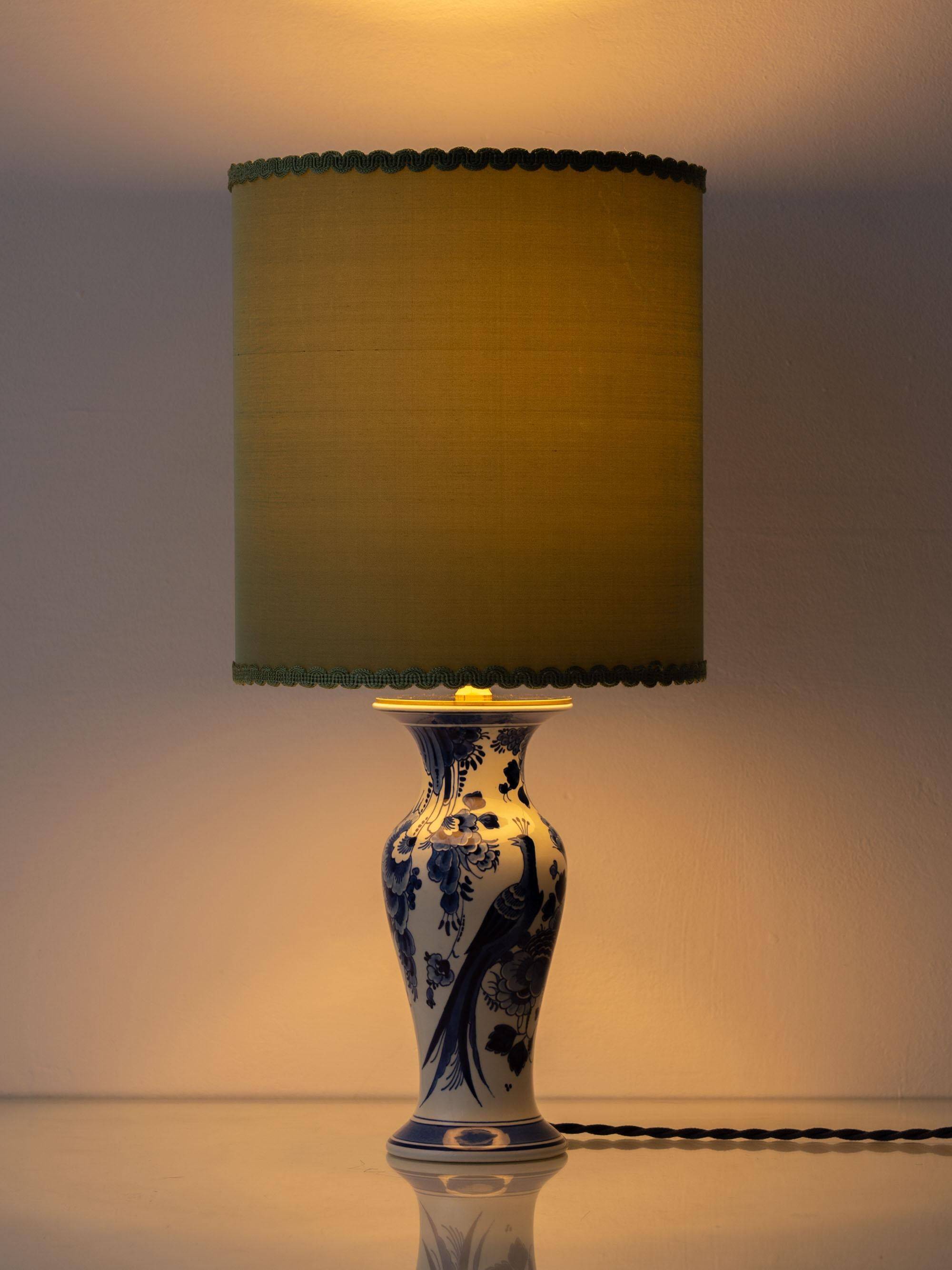 Pair of Chinese table lamps in Delft blue ceramic with new green silk shades.