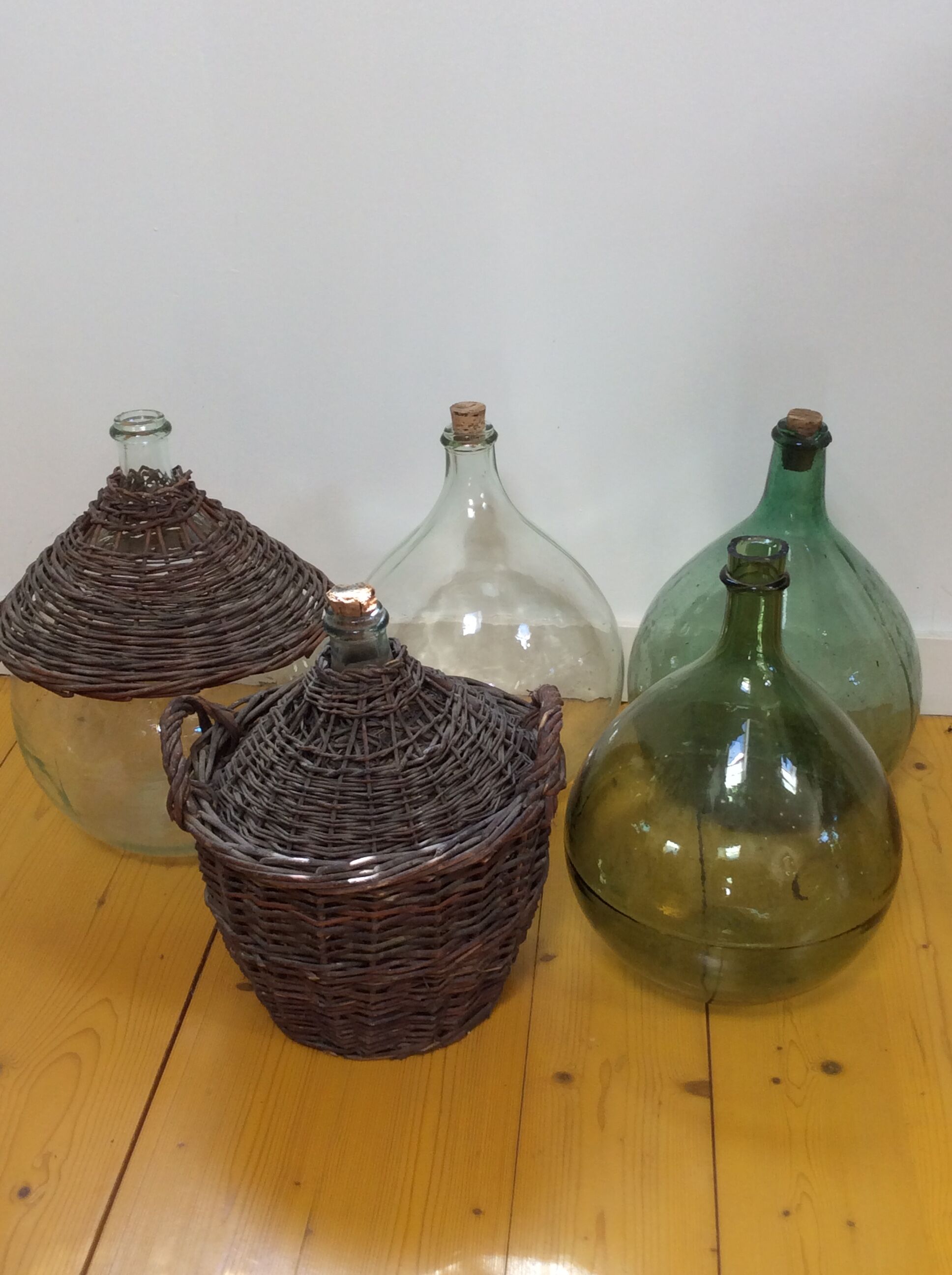 Demijohn in her braided wicker basket