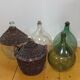Demijohn in her braided wicker basket