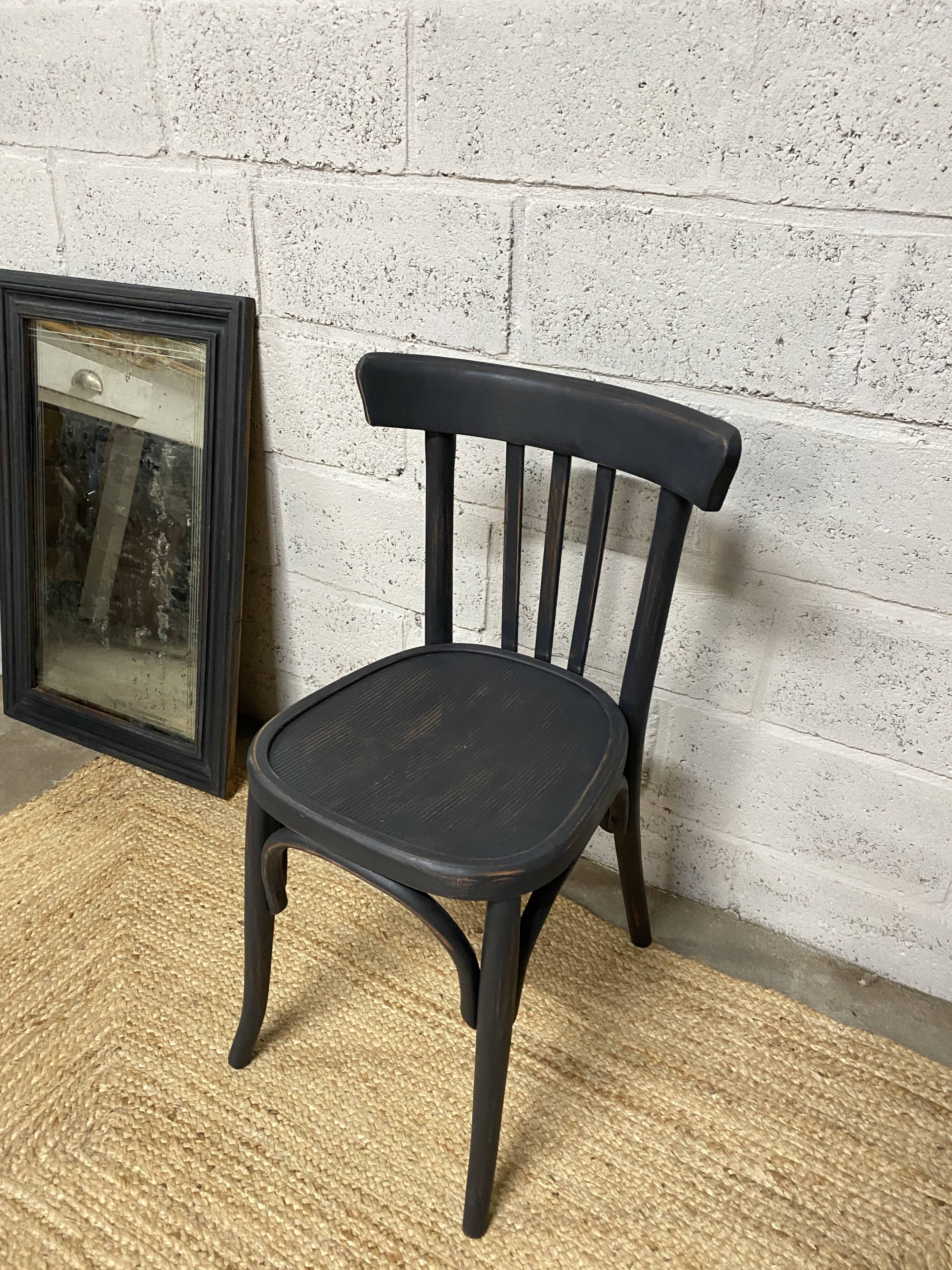 matte black bistro chair with a patina
