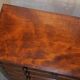 Victorian commode in flame wood with four drawers