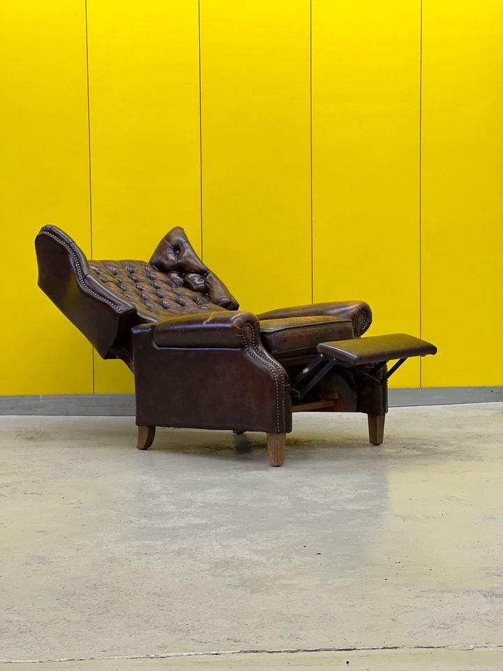 Brown vintage handmade chesterfield recliner armchair