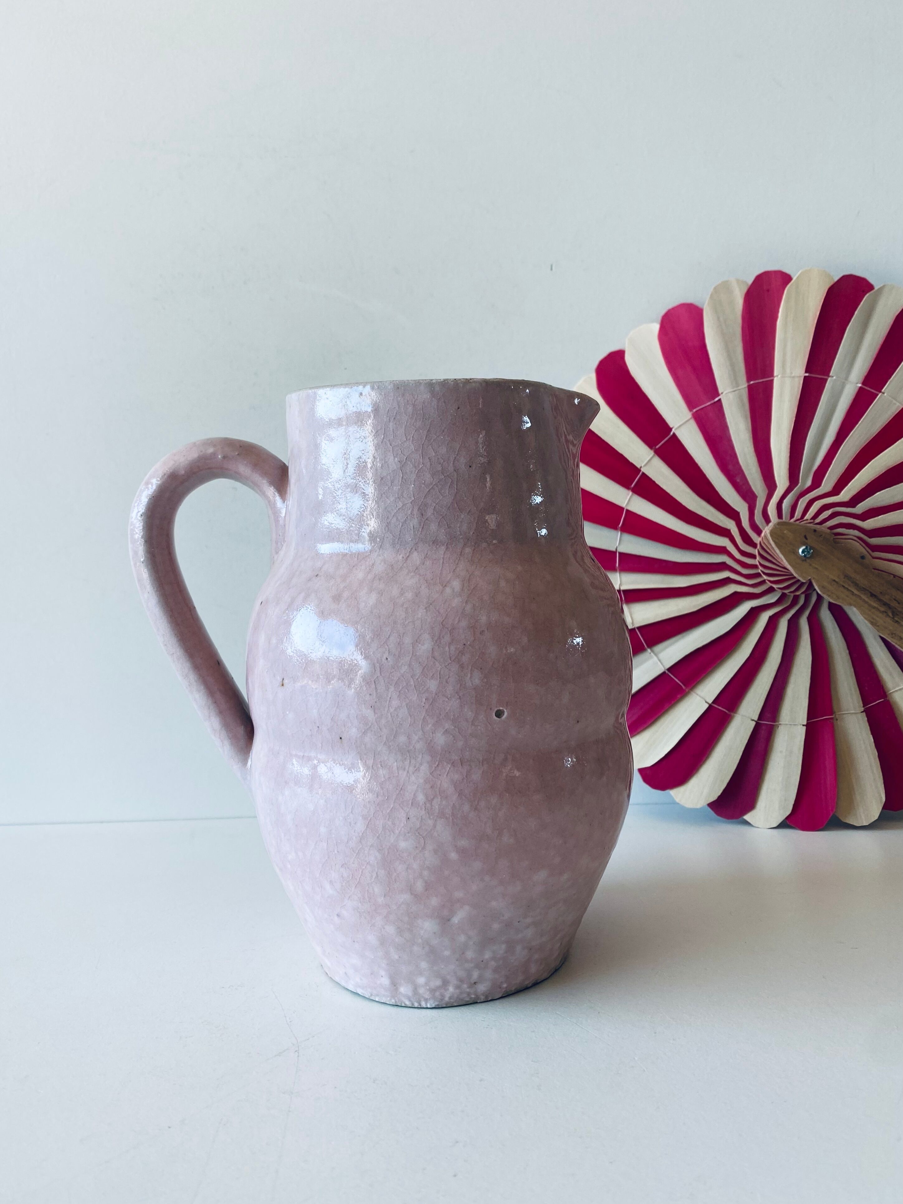 Pitcher in pink glazed ceramic