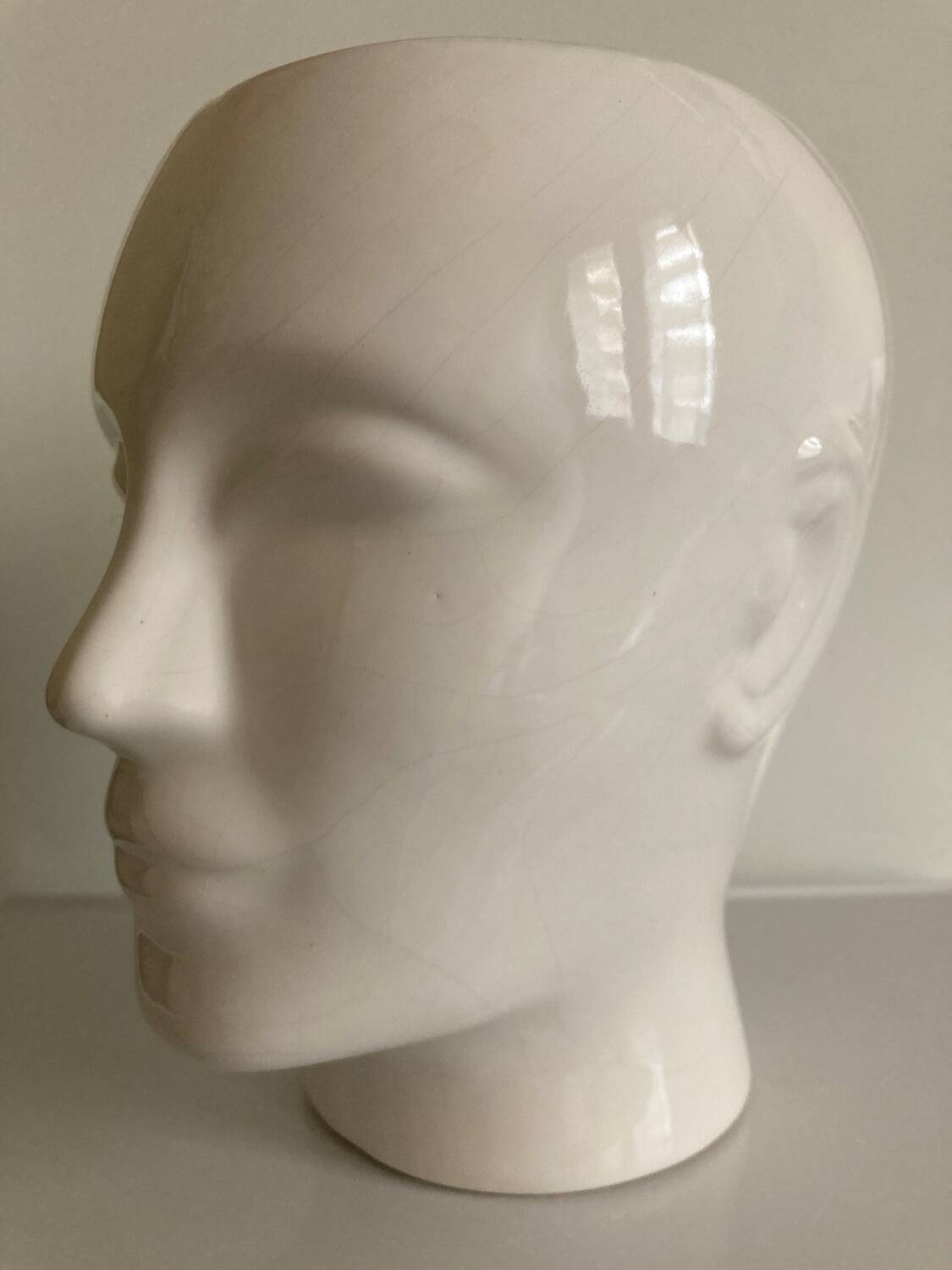Vintage white ceramic face-shaped vase or planter