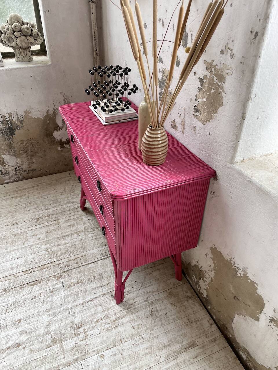 Vintage pink rattan chest of drawers
