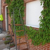 Old stepladder in metal and wood