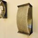 Pair of brushed steel and perspex wall lights, circa 1970.