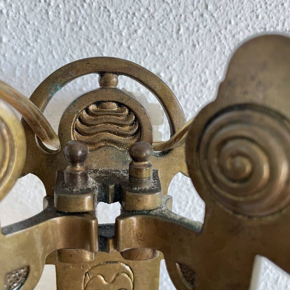 Art Nouveau style brass double piano wall lamp