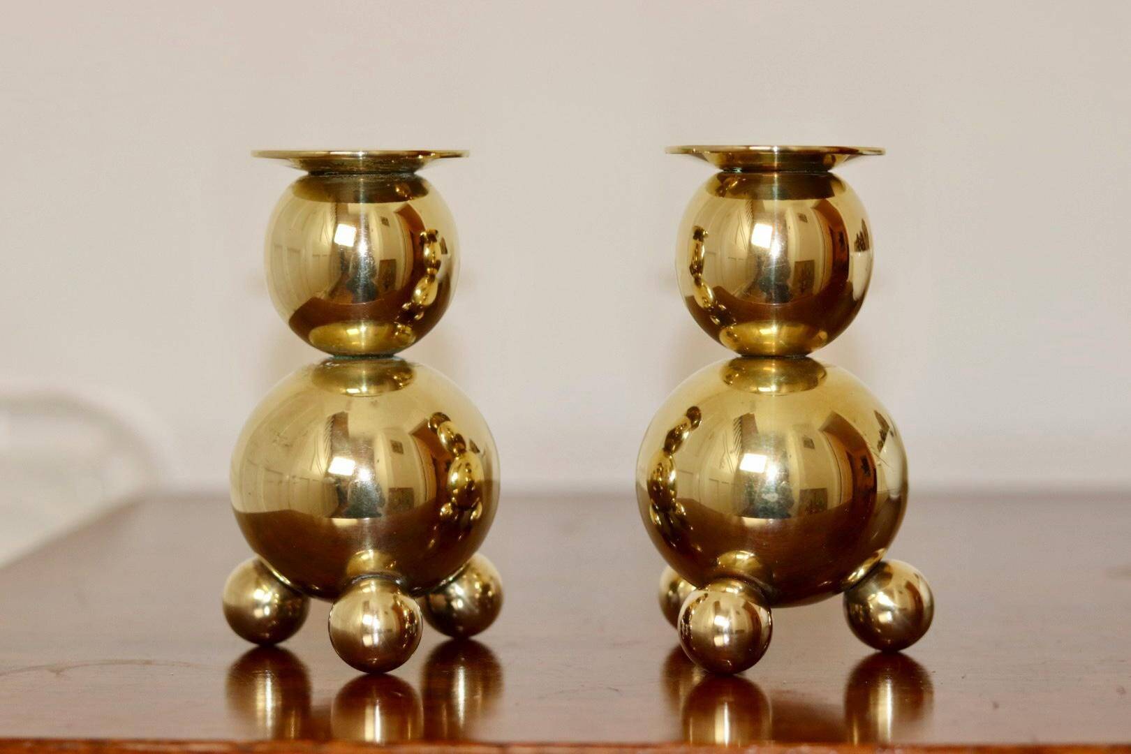Pair of Swedish brass candlesticks from the mid-century by Gusum.