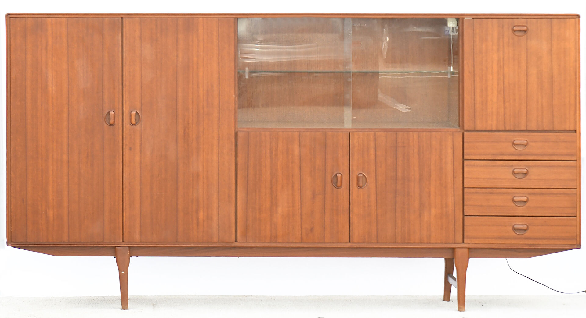Scandinavian teak living buffet forming a showcase