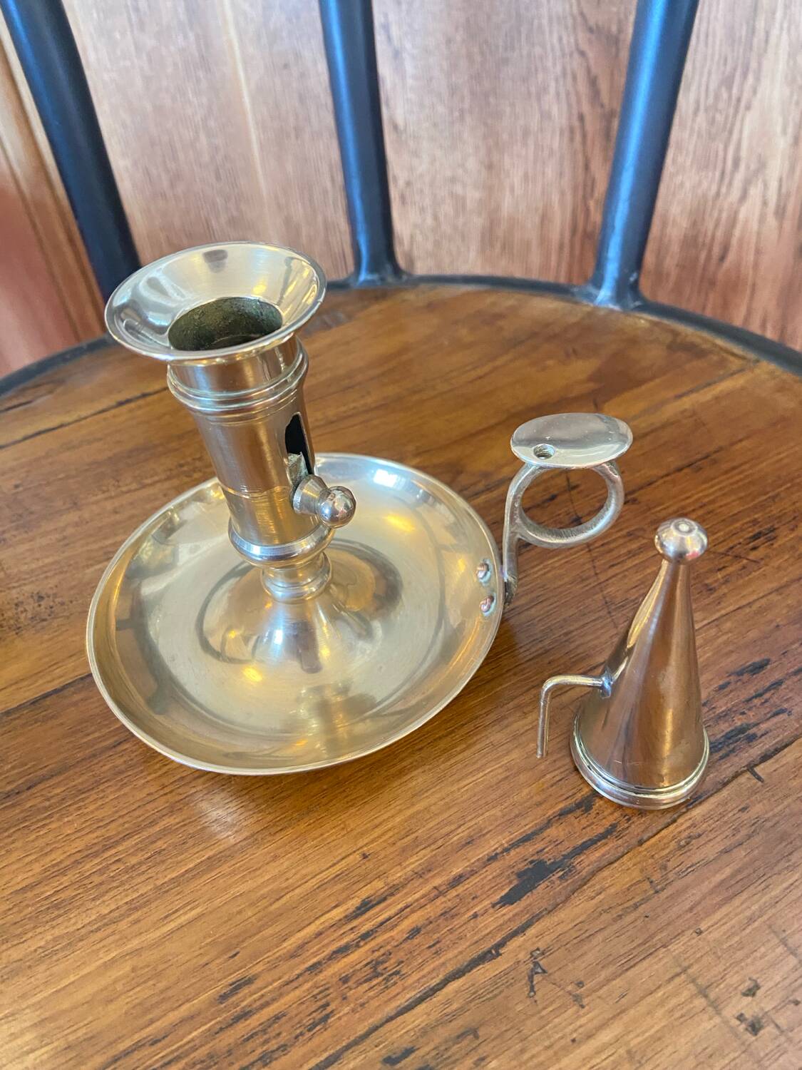 Brass candle holder with snuffer