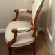 Pair of Louis XVI style medallion armchairs, late 19th / early 20th century.