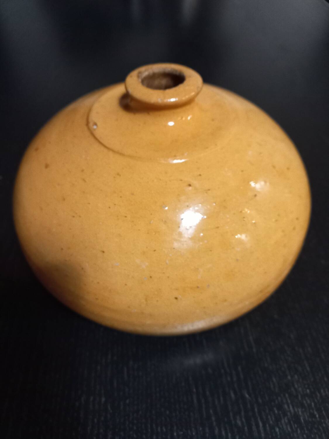 Old enameled terracotta hot water bottle
