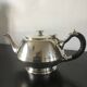 Set of teapots and milk jug.