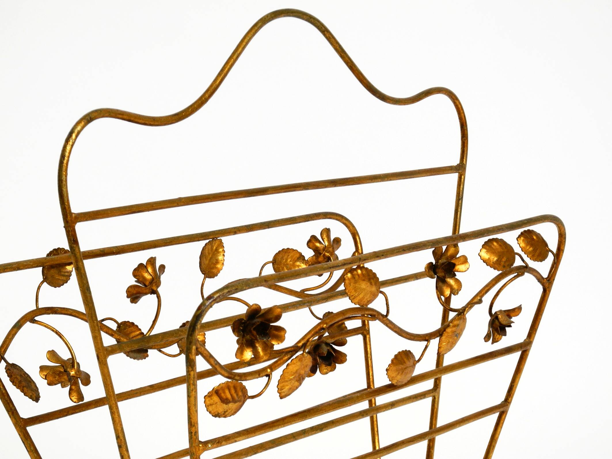 Extraordinary mid-century newspaper and magazine rack with a gilded metal