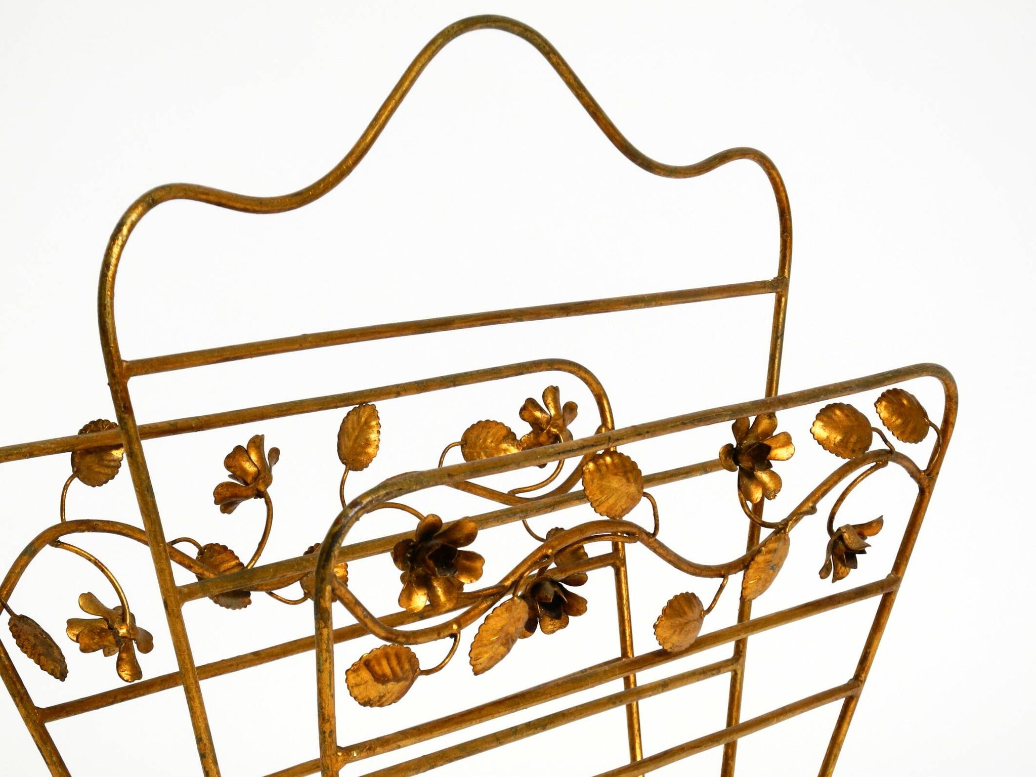 Extraordinary mid-century newspaper and magazine rack with a gilded metal