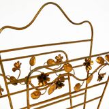 Extraordinary mid-century newspaper and magazine rack with a gilded metal