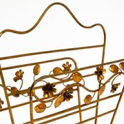 Extraordinary mid-century newspaper and magazine rack with a gilded metal