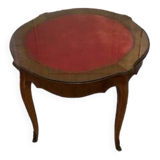 Table ronde avec plateau cuir rouge