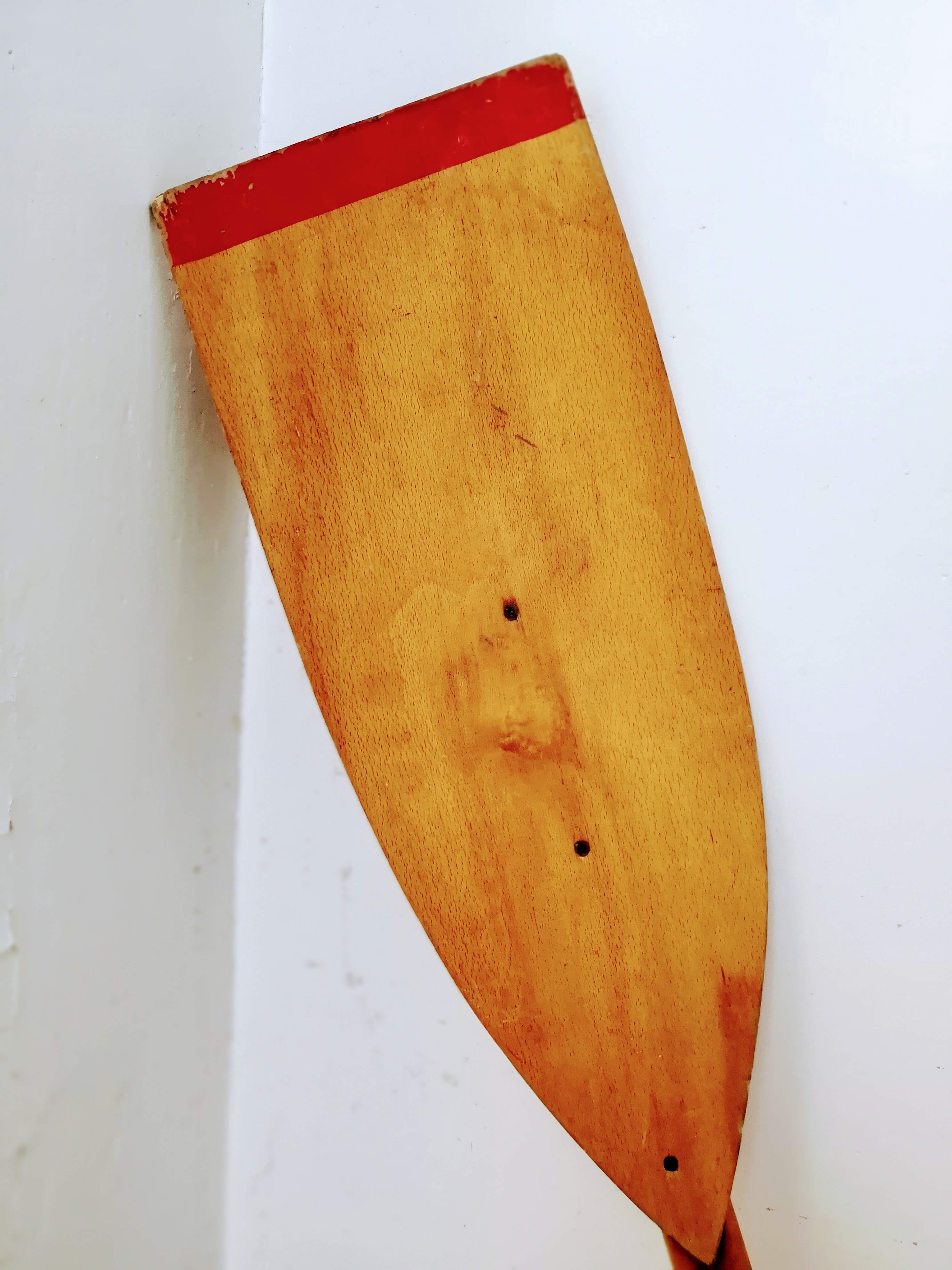 Pair of old wooden oars