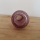 Vintage pink pressed glass carafe – retro decorative bottle with wooden stopper.