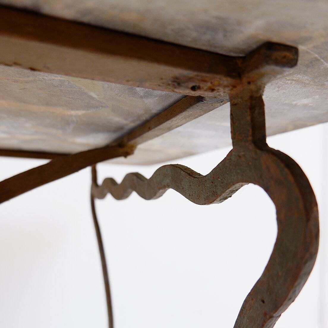 Wrought iron and marble coffee table