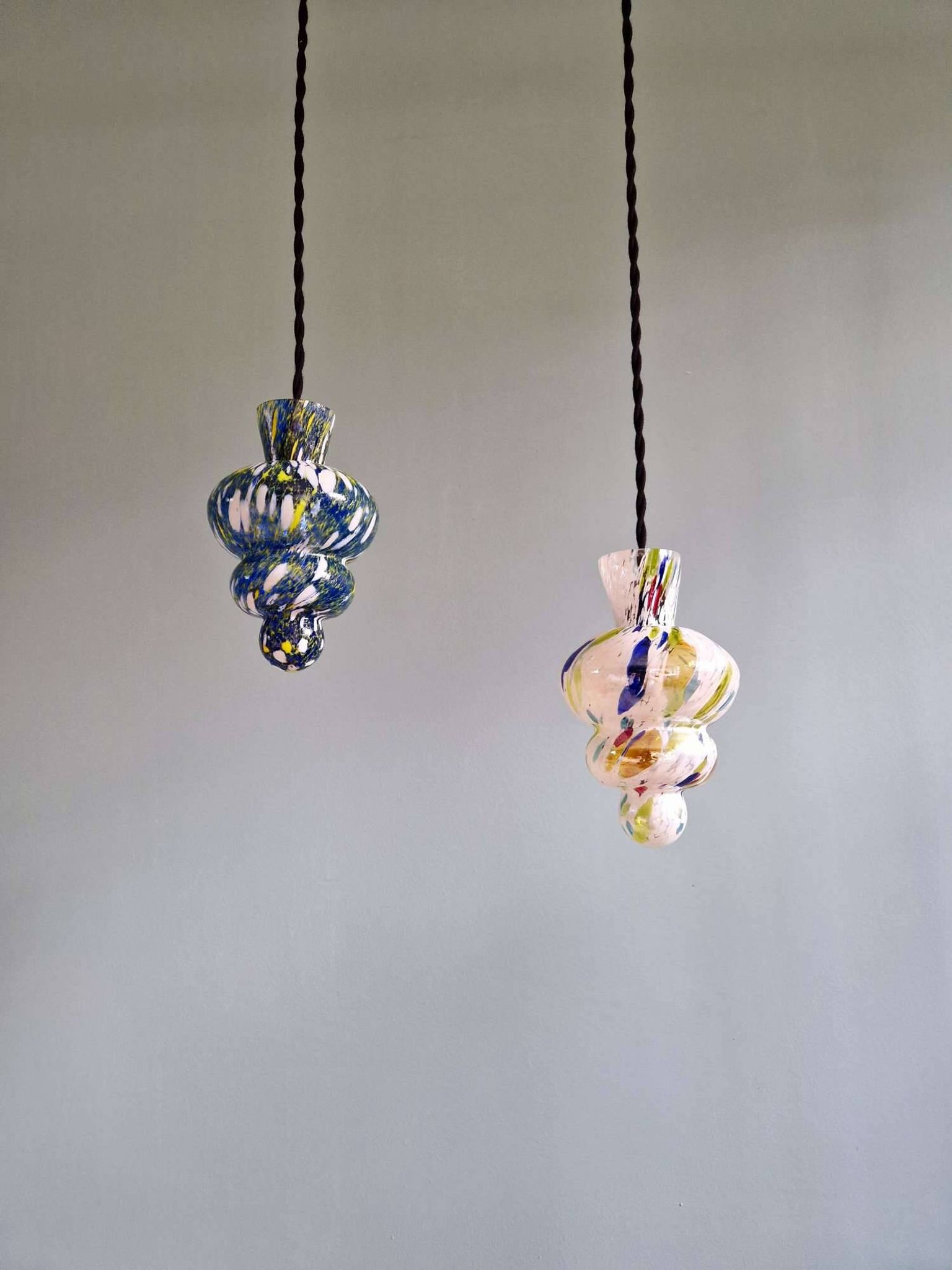 A pair of multicoloured blown glass suspensions, Murano, 1950-60.