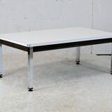 Coffee table chrome steel base, white melaminate top. France, circa 1970.