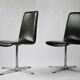 Pair of vintage swivel armchairs in black vinyl, 1970s