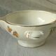 Sauceboat in earthenware decorated with four seasons vegetables.