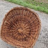 Old throne basket armchair in woven wicker