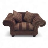 Large weighty love seat with the original matching cushions. Marked "Handmade in Holland"