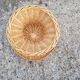 Vintage woven wicker diabolo coffee table