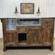 Early 20th-century oak bar counter with period zinc and tin cladding.
