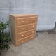 Commode en bois naturel