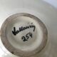 Coupe Vallauris sign with enamelled back green yellow golden black