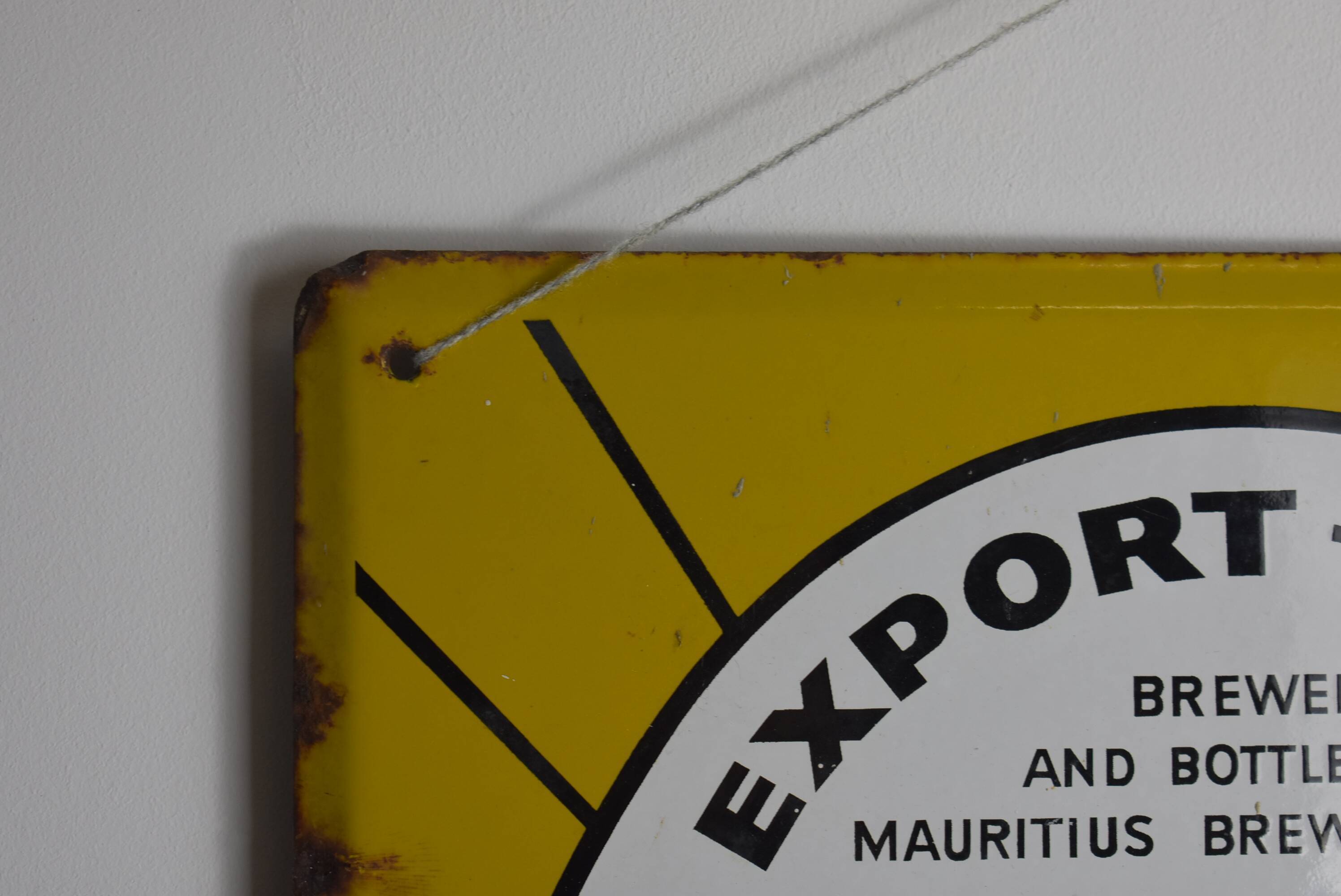 Stella Pils beer enamelled plate