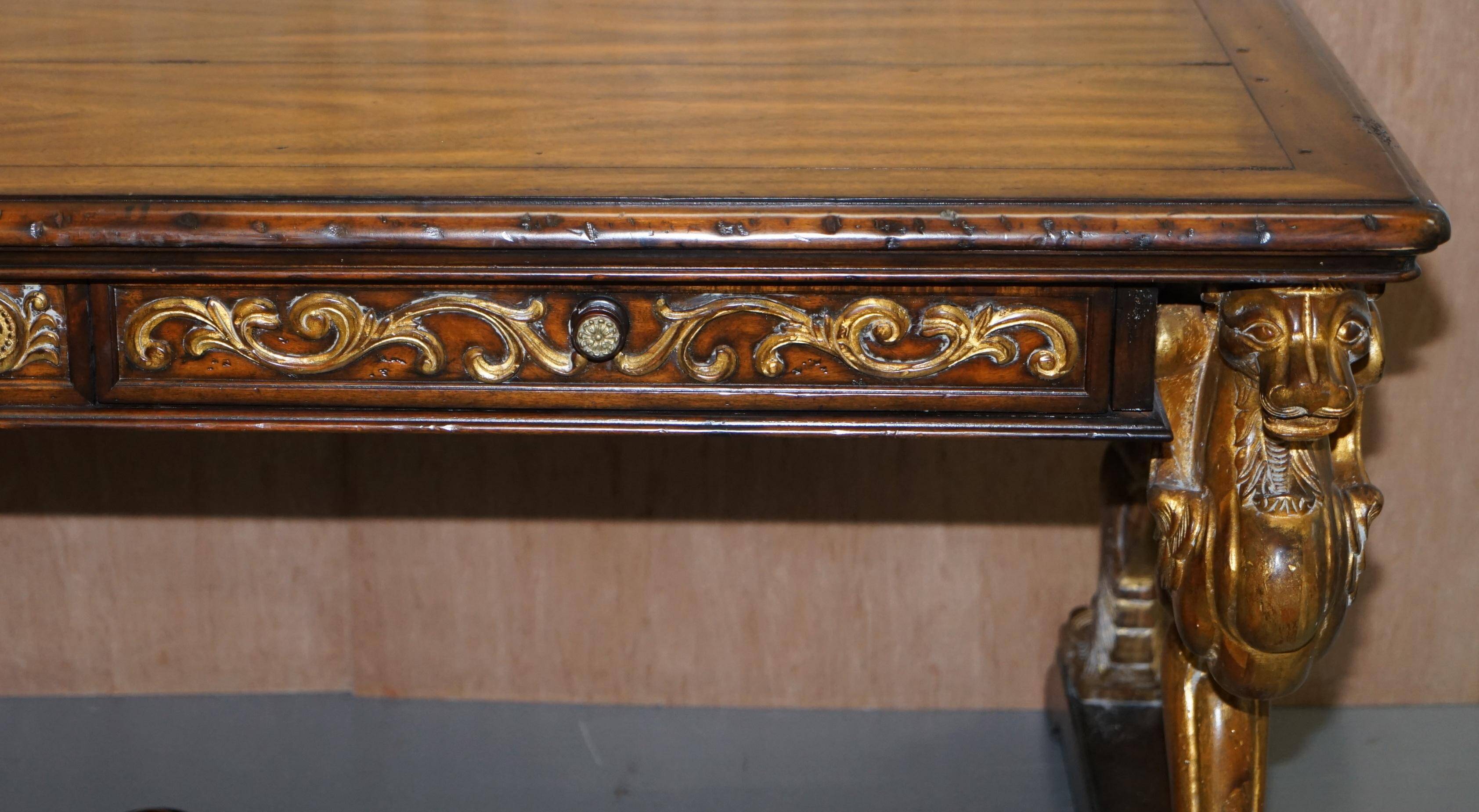 Double-sided writing desk in hardwood with gilt griffins, RJ Horner style.